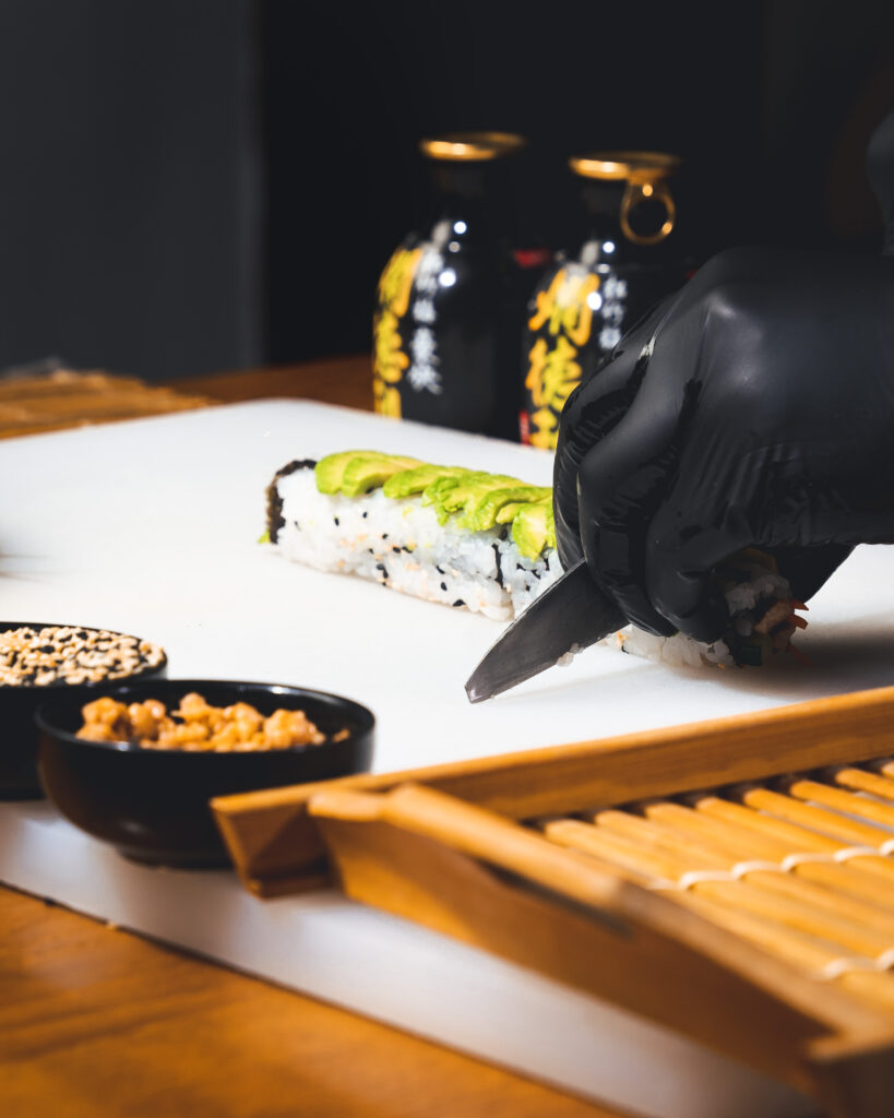 Chef preparing sushi at The Library Lagos