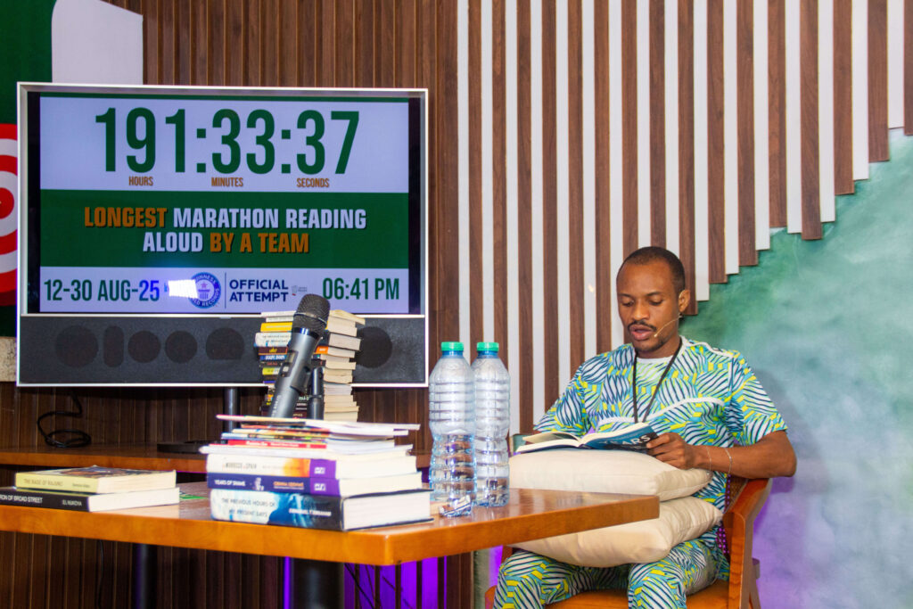One of the marathoners, John John Obot, reading during the marathon held at Mazimi @ The Library Lagos